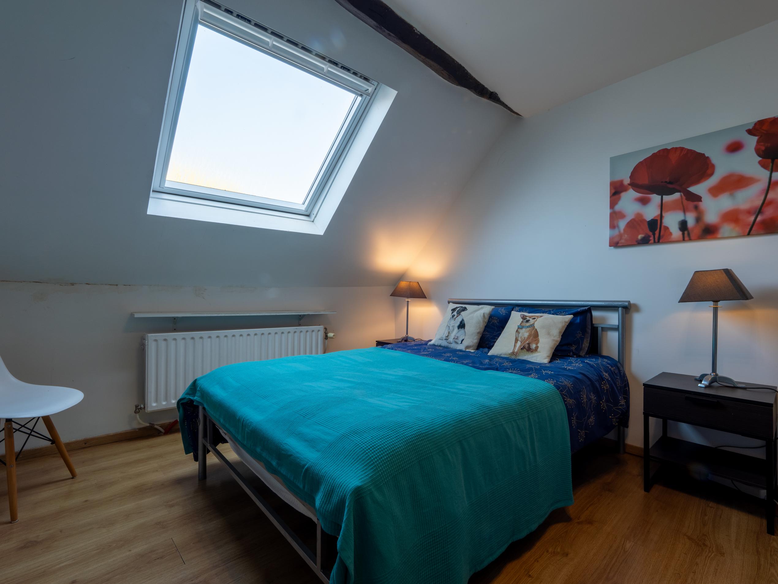 Chambre bleue du gîte L'Écurie